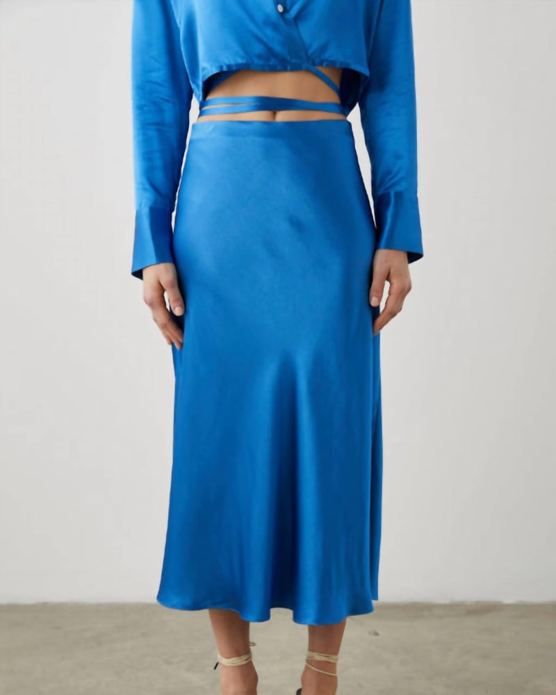 Front of a model wearing a size large Anya Skirt in Cobalt in Cobalt by Rails. | dia_product_style_image_id:332282